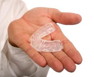 Athletes' risk of concussion reduced by custom-made mouthguards